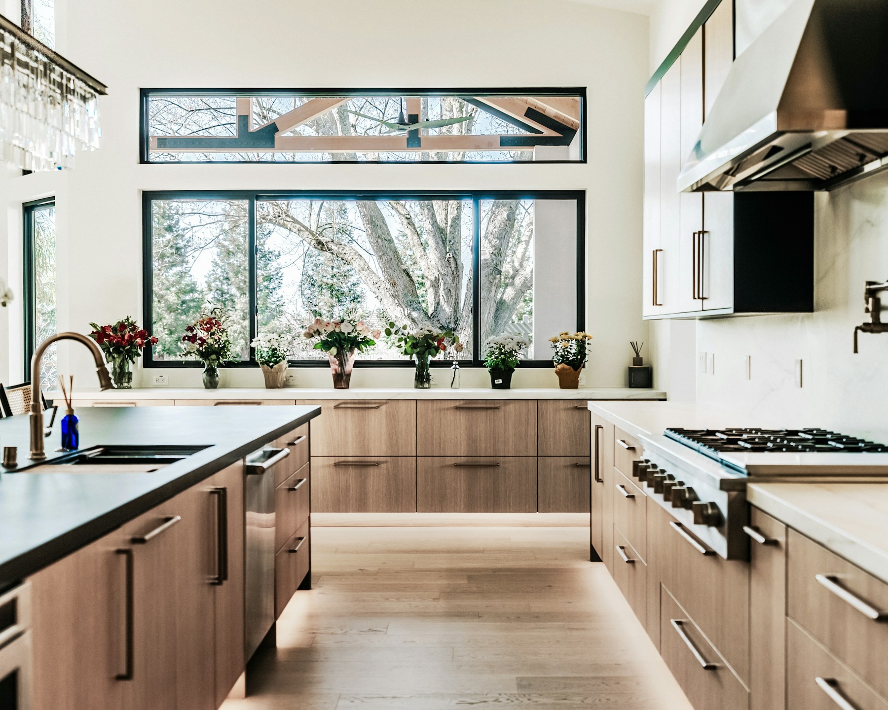 Oak kitchen with a large window and natural light